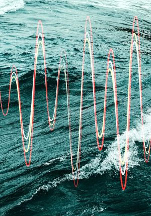 Abstract graphic of colorful sine wave patterns overlaid on a photo of choppy ocean waves.